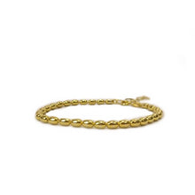 Load image into Gallery viewer, 18K gold plated bracelet with lobster clasp and gold string bead design
