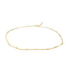 Load image into Gallery viewer, Gold thin chain choker with small gold beads spaced out and lobster claw clasp.
