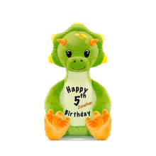 Load image into Gallery viewer, Light green triceratops dinosaur sitting upright with orange horns and feet pads, eyelashed eyes, baby tooth smile, &quot;Happy 5th Birthday&quot; in black text, and a child&#39;s name in orange text angled to the right of the previous text
