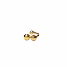 Load image into Gallery viewer, Front view gold ring with three spheres of increasing size
