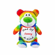 Load image into Gallery viewer, Rainbow striped bear with white belly, snout, and feet. Comes with &quot;One Of A Kind&quot; in black text and a child&#39;s name in red text on belly
