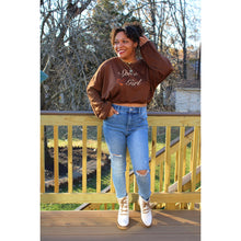 Load image into Gallery viewer, front view of brown &quot;Spice Girl&quot; sweatshirt with ballon sleeves with light wash distressed jeans and white heel and brown lace boots
