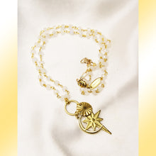 Load image into Gallery viewer, Golden colored sun, crescent moon, &amp; north star charms cluster with moonstone bead rosary chain.
