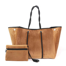 Load image into Gallery viewer, Tote bag completely expanded and matching wristlet.
