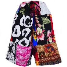 Load image into Gallery viewer, Patchwork shorts with drawstring waistband and colorful patterns.
