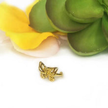 Load image into Gallery viewer, Front view of butterfly ear cuff with cutouts.
