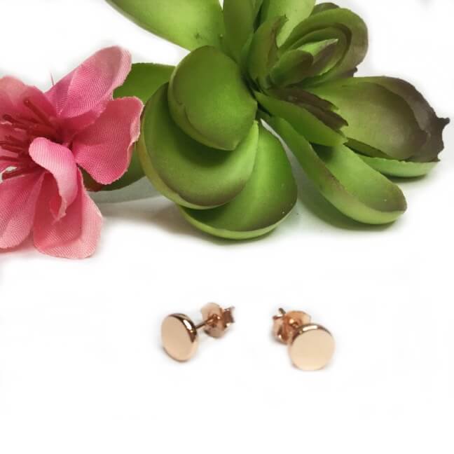 Rose gold flat round stud earrings with backings